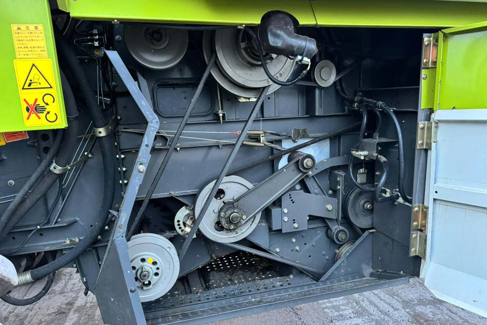 Close-up of agricultural machinery components on a vehicle